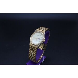 Citizen Quartz Mens Gold‎ Tone Watch Day Date White Dial Expansion Band